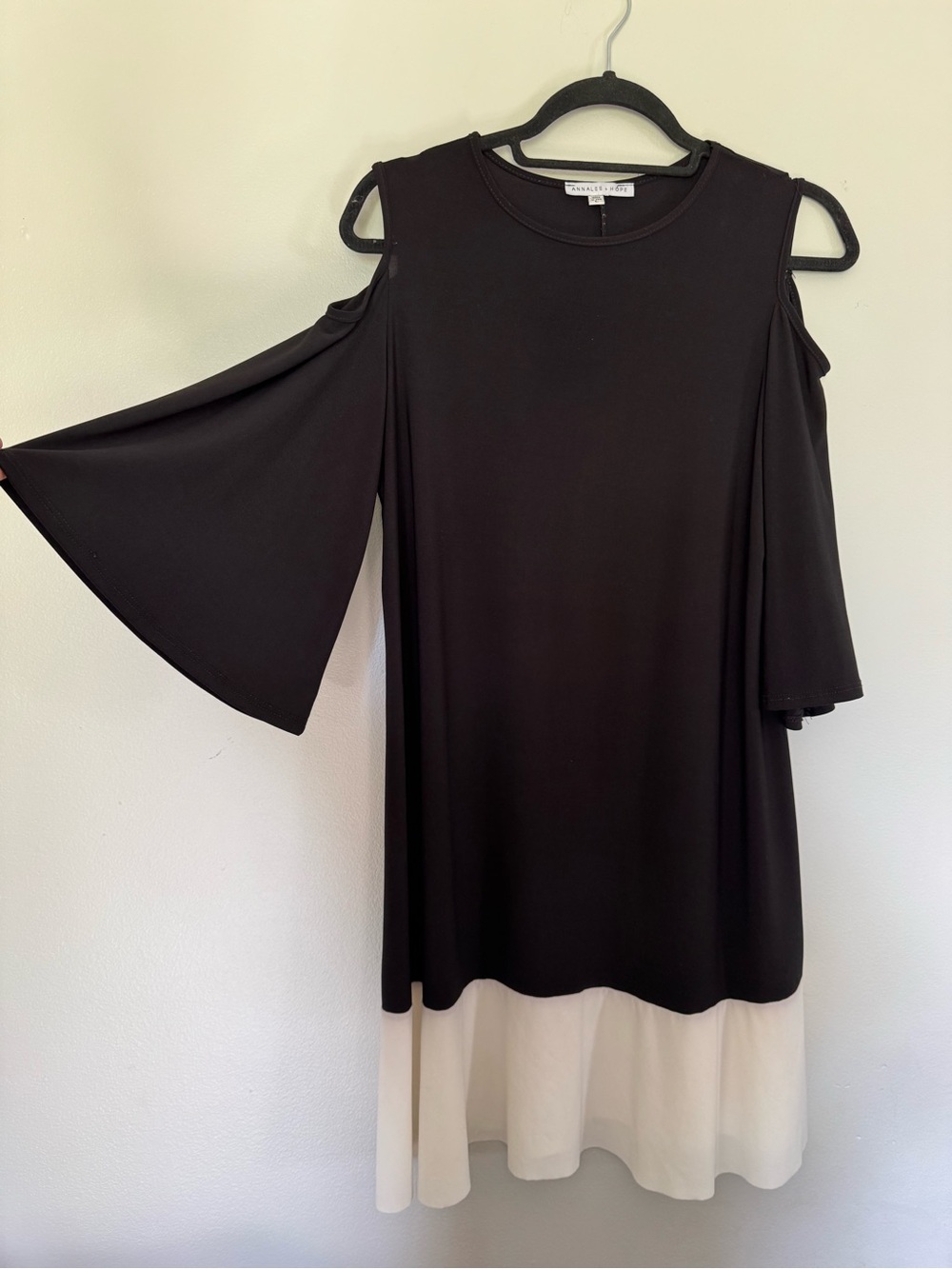 Black Dress with Cream Hem and Cold-Shoulder Bell Sleeves